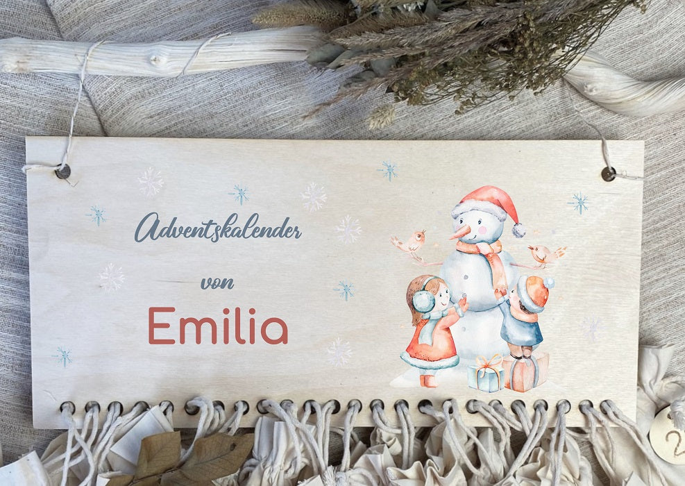 Adventskalender aus Holz und Stoffsäckchen Kinder mit Schneeman